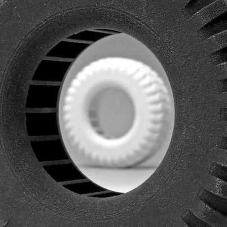 Tire sample in foreground and background made from SLS TPC Elastomer